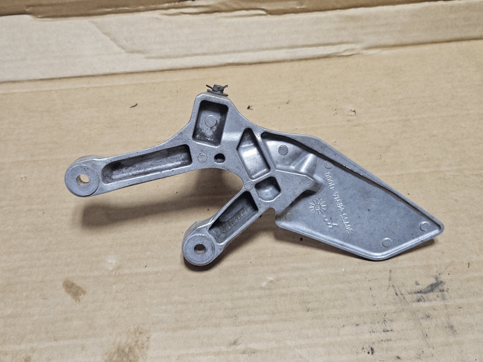 2008-2016 Honda CB1000R OEM Front Left Footrest Hanger Bracket Set